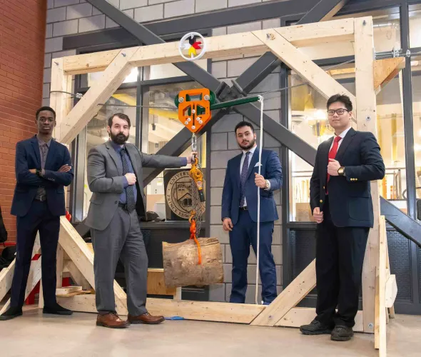 four engineering students and their second-year project