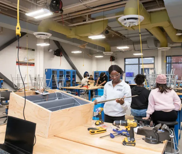 UPEI engineering student Rosetta Shokunbi working on a project in a lab