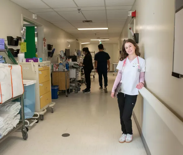UPEI nursing student Maya White in a hallway at the Queen Elizabeth Hospital