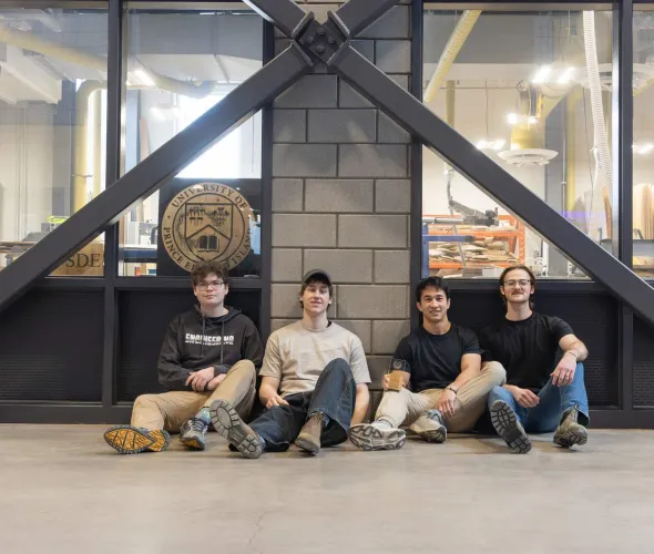 four engineering students in the Faculty of Sustainable Design Engineering building