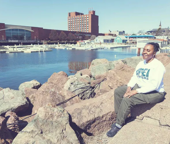 UPEI Master of Arts in Island Studies student Ayana Arnaud on the Charlottetown waterfront