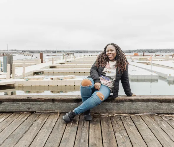UPEI Master of Arts student Aneilla Dennis on the Charlottetown waterfront