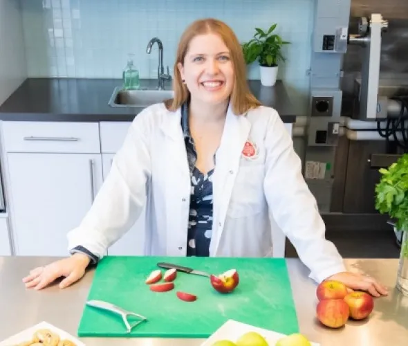 female food product developer in a kitchen