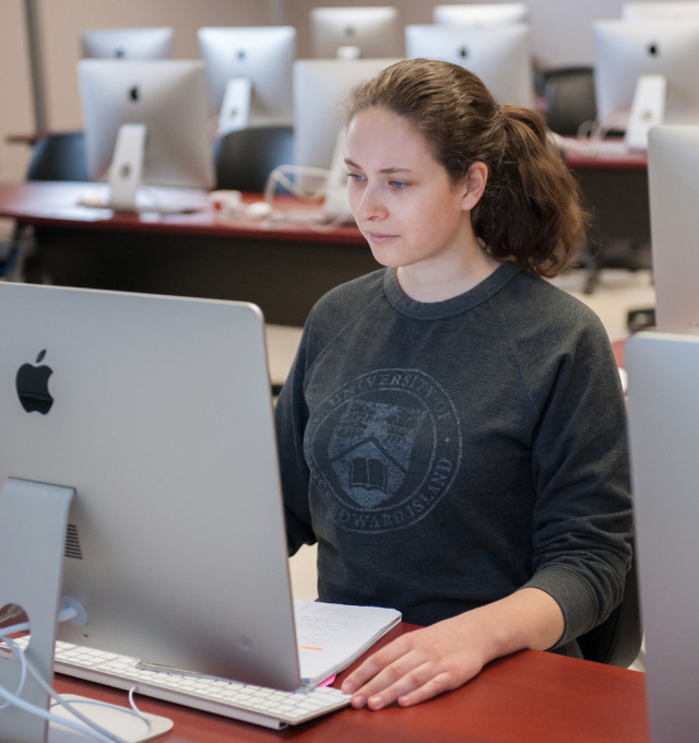 A student harnessing the power of a computer